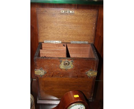 A VINTAGE OAK LIDDED BOX WITH LOWER ROTATING SECTION AND WHITE METAL MOUNTS A/F