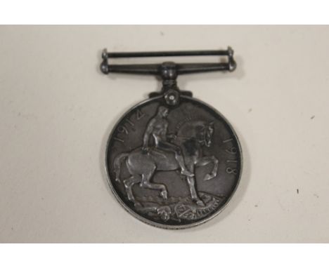 A WWI MEDAL AWARDED TO PTE. J. E. STEPHENS R. W. FUS