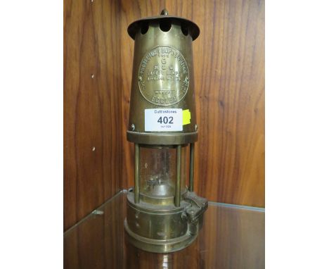 A VINTAGE BRASS ECCLES MINORS LAMP