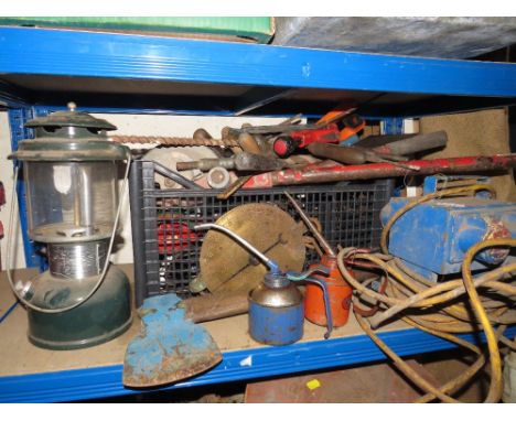 A BOX OF TOOLS TOGETHER WITH AN ELECTRICAL EXTENSION