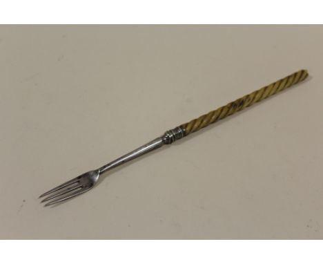 AN ANTIQUE HALLMARKED SILVER PICKLE FORK 
