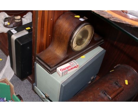 A VINTAGE OAK NAPOLEON HAT MANTEL CLOCK TOGETHER WITH A HEURTIER P6-24 PROJECTOR