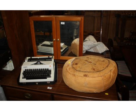 AN EASTERN POUFFE, PINE CABINET AND VINTAGE TYPEWRITER