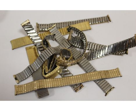 TWELVE VINTAGE GOLD PLATED WATCH STRAPS 