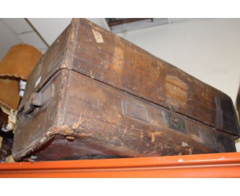 A SMALL VINTAGE LEATHER TRUNK