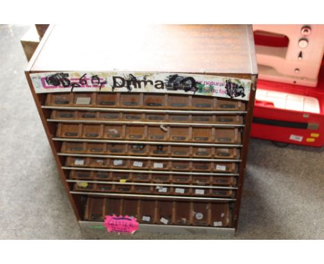 A VINTAGE MULTI DRAW SHOP DISPLAY CABINET