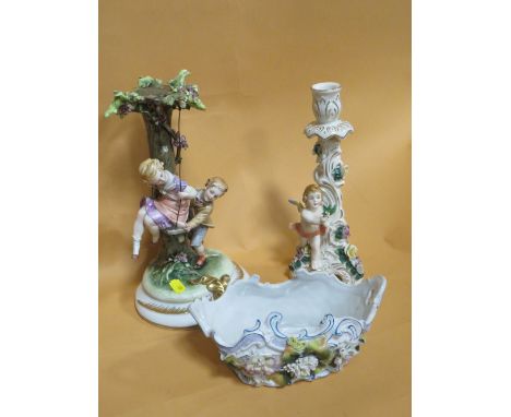 A CAPE DI MONTE FIGURE GROUP OF A BOY AND A GIRL ON A SWING A/F TOGETHER WITH A DRESDEN CHERUBIC CANDLESTICK AND A FLORAL VAS