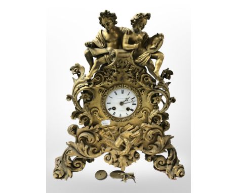A late 19th century French gilt metal figural eight day mantel clock, height 41 cm.