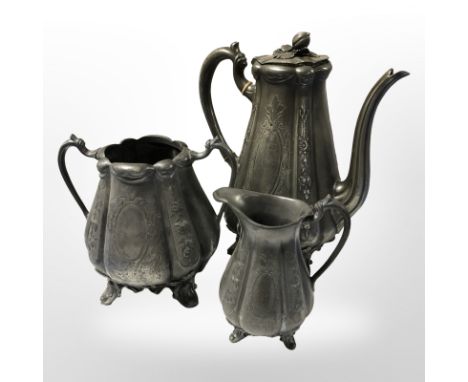 A Victorian pewter three piece tea service, height 24 cm.
