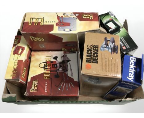 A group of boxed tools including Power Devil router, power jigsaw and hot air gun, Black & Decker sander, Parkside electric n