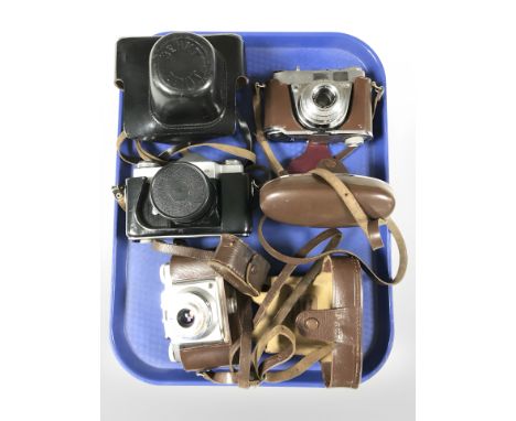 A Zenit-B camera, Kodak Retinette IA camera and an Agfa camera 