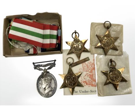 A terratorial efficiency medal group including 39/45, Italy, France and Germany Stars and South Africa Star with 8th Army bar