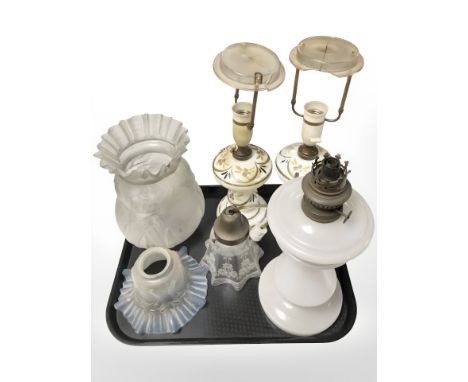 An opaque glass oil lamp base, further pair of lamps (wired), three moulded glass light shades 