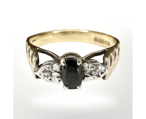 A 9ct gold sapphire and diamond ring, size N CONDITION REPORT: 2.6g