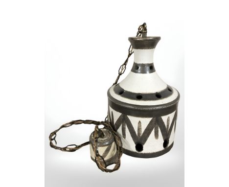 A 1970's glazed earthenware light shade, height 32 cm.