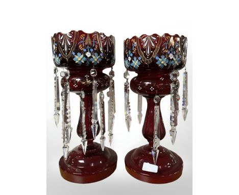 A pair of Victorian ruby glass lustres, height 36 cm.