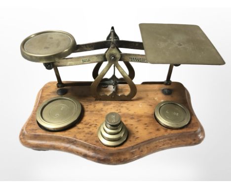 A set of Victorian letter scales with weights.
