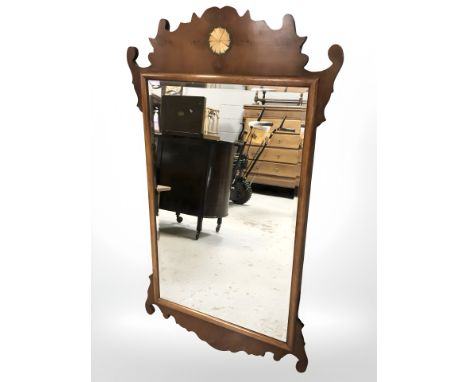 A Chippendale style bevelled mirror, 100 cm x 57 cm 