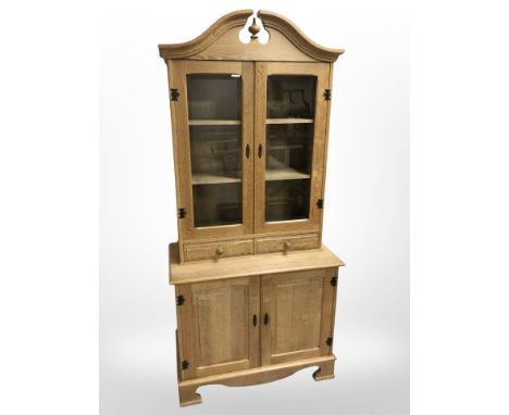 A light oak contemporary kitchen dresser with glazed cupboards above two drawers, width 90 cm, height 194 cm, depth 47 cm.  C