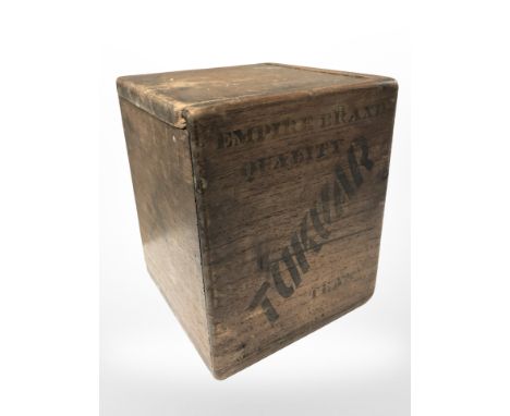 An antique wooden tea caddy.