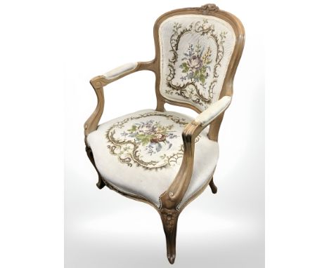 A continental walnut armchair with tapestry fabric, width 61 cm 