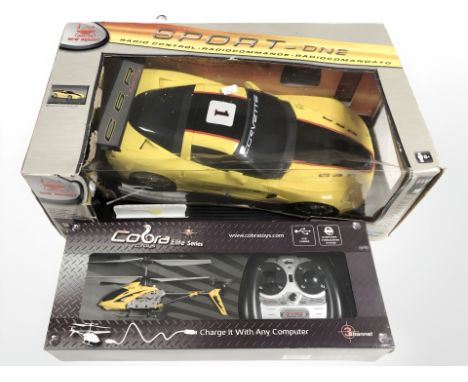 A New Bright Quality Toys Sport-1 radio controlled corvette C6.R and a further remote controlled helicopter. 