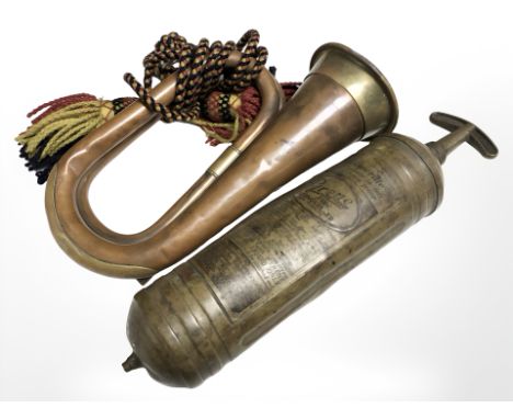 A Pyrene brass fire extinguisher and copper and brass bugle 