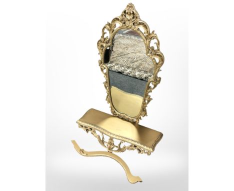 A reproduction gilt finish console table and mirror 