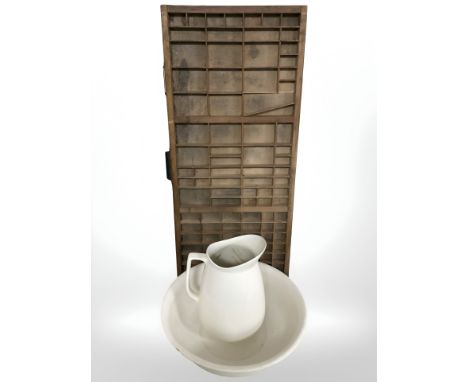 A pottery wash jug, basin and a printers type tray.