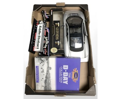 A Maisto 1/12 scale Jaguar XJ 220 together with a Corgi Guinness curtainside lorry, further Eddie Stobart lorry on plinth, Ca
