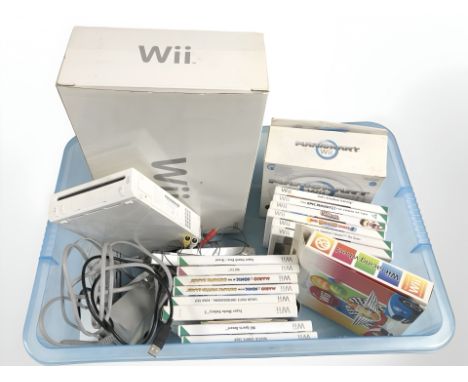 A Nintendo Wii console, various games, controllers, etc. (1 box)