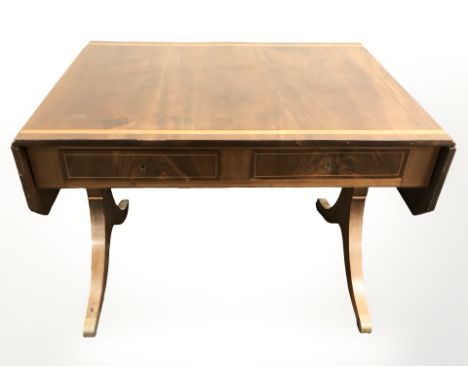 A 19th century inlaid mahogany sofa table, fitted with two drawers, width 100 cm.