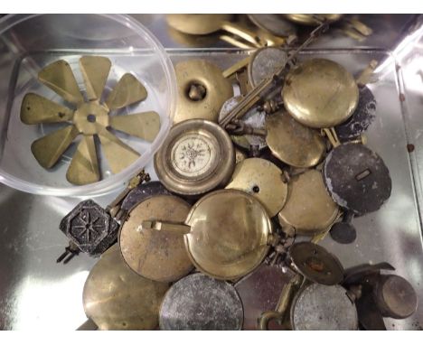 Tin of clock pendulums. Not available for in-house P&amp;P 