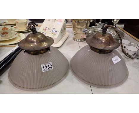 Pair of brass and glass ceiling light fittings. Cracks to both shades by fitting, would benefit from polish/clean. Not availa
