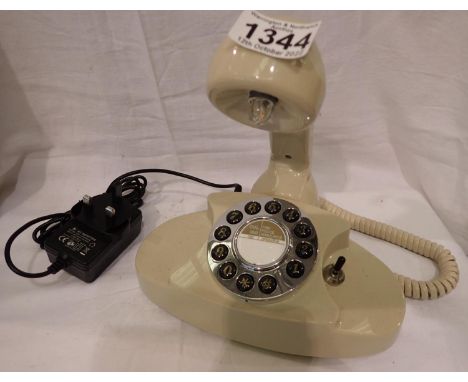 Ivory coloured telephone converted to lamp. All electrical items in this lot have been PAT tested for safety and have passed.