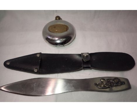 Daley travel clock and a singular throwing knife. P&amp;P Group 1 (£14+VAT for the first lot and £1+VAT for subsequent lots) 