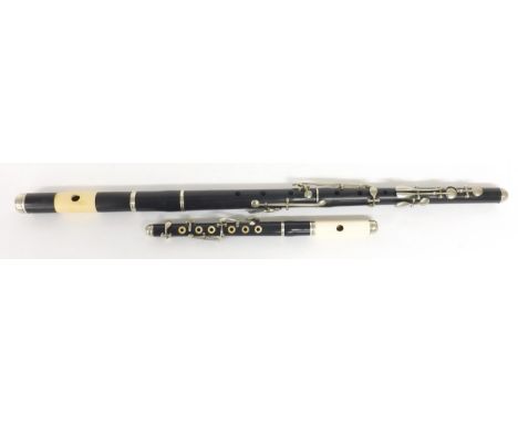 Eight key blackwood flute by and stamped Kay &amp; Co Ltd, Worcester; also a blackwood and ivory six key piccolo, unstamped, 