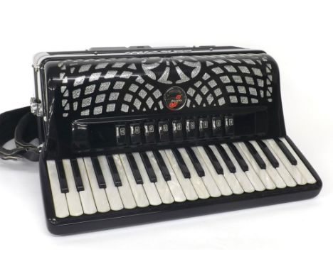 Fantini Professional Model piano accordion with ninety-six buttons and nine switches, black finish, soft case 