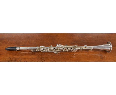 Metal clarinet inscribed Grand Rapids, made in U.S.A., ser. no. 91454A, two mouthpieces, case 