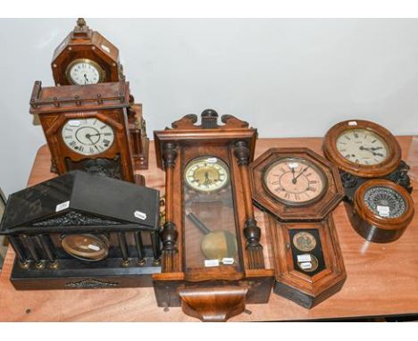 A Vienna type striking wall clock, two drop dial striking wall clocks, a Victorian striking mantle clock of architectural for