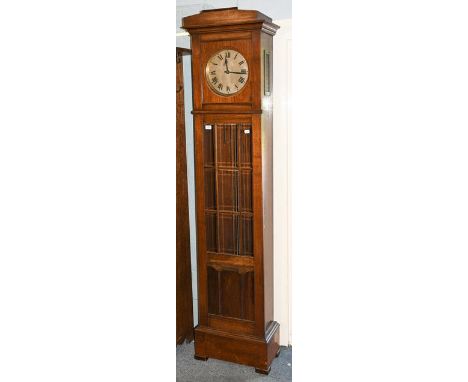 An Art Deco mahogany striking longcase clock