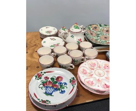 A collection of assorted Faience, including a French tea-service, various tin-glazed plates, an Italian horsd'oeuvre dish and