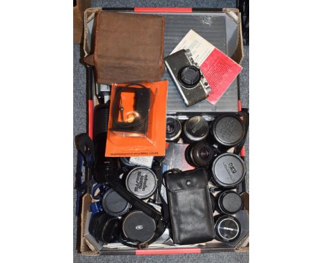 A quantity of camera lenses and equipment