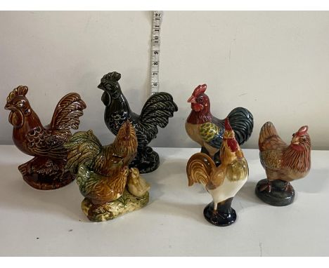 A selection of ceramic Cockerel figurines, shipping unavailable