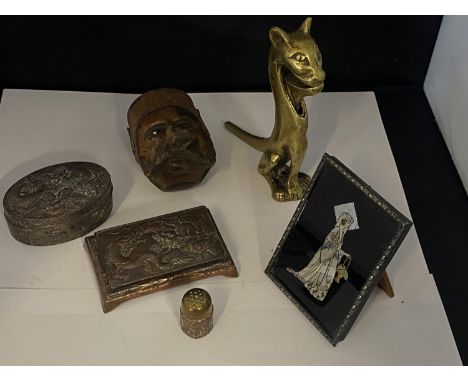 A assortment of novelty items including brass nutcracker, butterfly picture and ornate trinket boxes etc