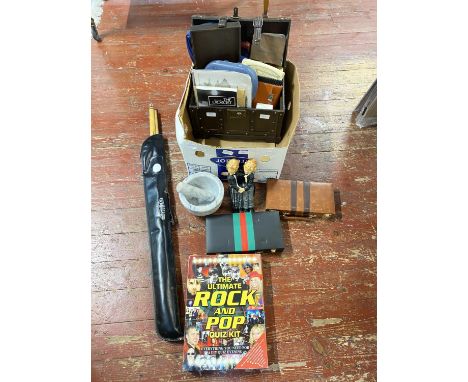 A box of mixed collectibles including games, pestle and mortar etc, shipping unavailable