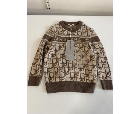 A children's Christian Dior jumper size 1-2