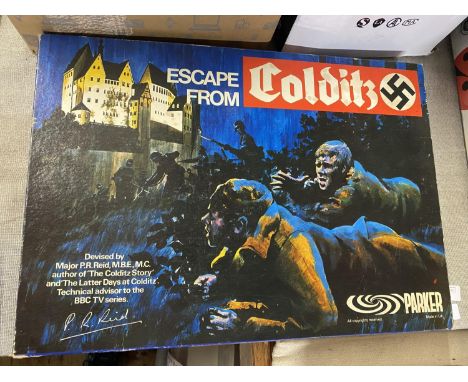 A boxed Colditz board game (unchecked)
