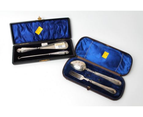 Cased set of silver spoon and fork and silver handled shoe horn and button hook 