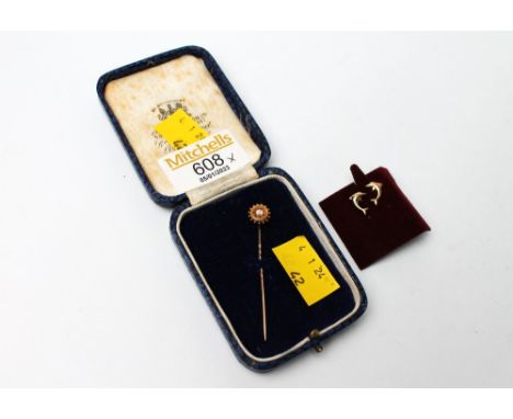 Pair of 9ct gold dolphin earrings and a stick pin